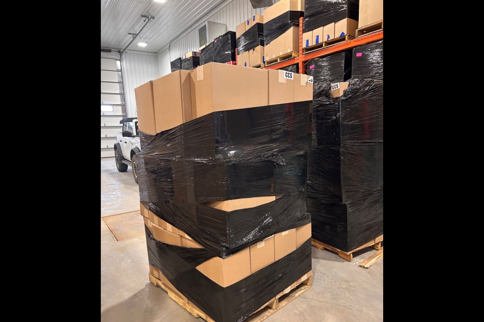 During the investigation, officers searched the vehicle and found about 247 grams of opium and 490 boxes containing approximately 4.9 million unstamped cigarettes.