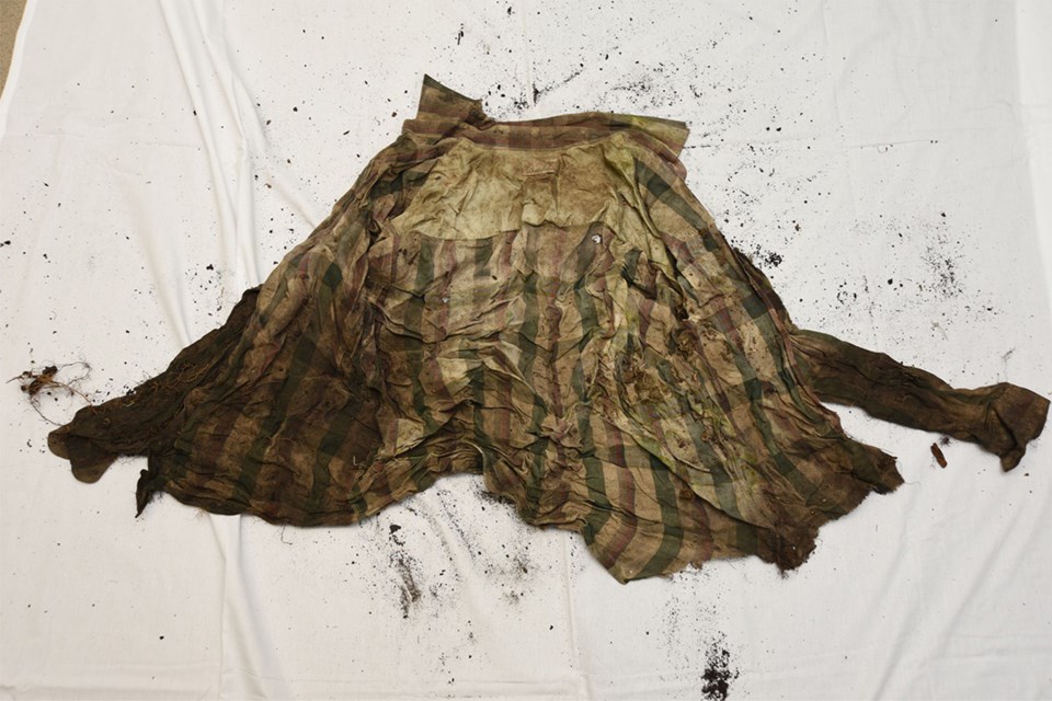 The remains of a shirt.