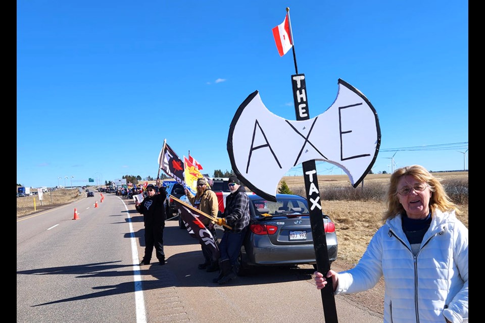 Axe the Tax protesters at the Saskatchewan - Manitoba border along the TransCanada Highway.