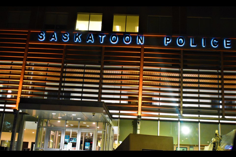 The facade of the Saskatoon Police Service is illuminated by orange lights in honor of the Missing People Week and the commemoration of the National Day for Truth and Reconciliation.