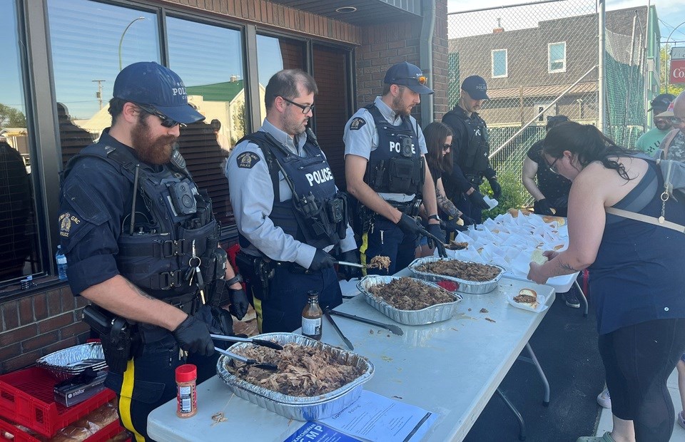 Following a full day of July 1 activities, RCMP members in Cut Knife helped serve supper.
