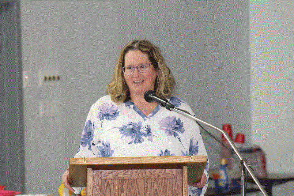 Annette Brown entertaining the crowd with her retirement speech. 
