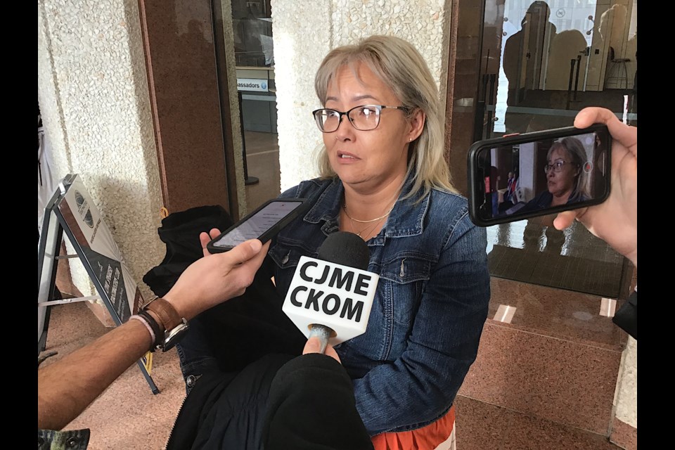 Regina resident Wanda Natawayous speaks to reporters following her emotional presentation to council Dec. 15 on the homeless issue.