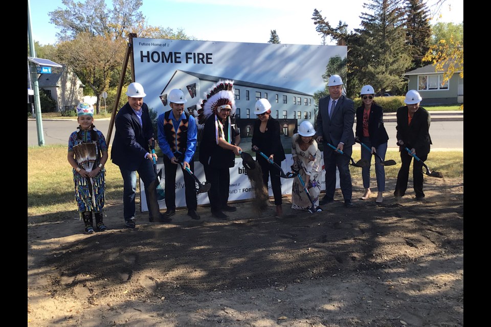 Dignitaries turn the sod to officially kick off construction of the 29-unit “Home Fire” rapid housing initiative project.