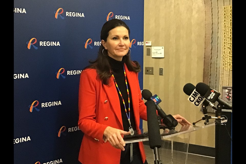 Mayor Sandra Masters speaks to reporters following the passage of the budget at City Hall in Regina.