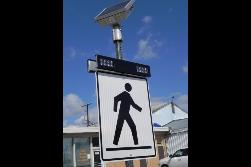 New pedestrian walk lights are present when crossing Main Street Unity to the office mall at the south end of Main                     