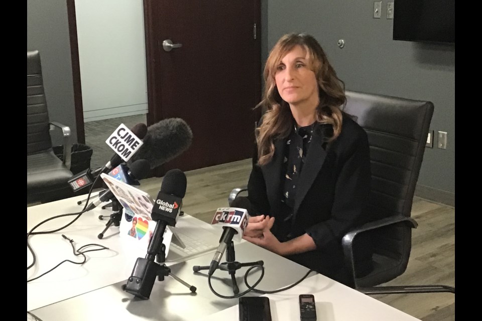Niki Anderson speaks to reporters on the departure of REAL 
CEO Tim Reid.