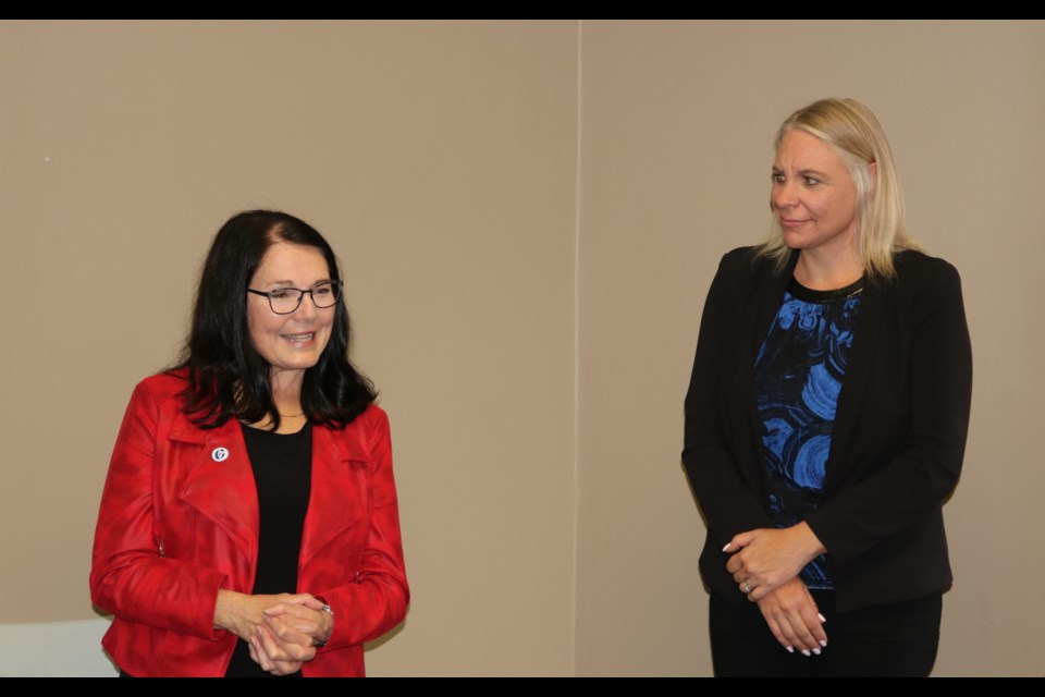 Conservative candidate Cathay Wagantall, left, and her campaign chair Vanessa Andres.