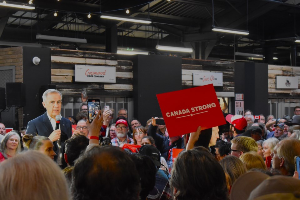 Liberal Leader Mark Carney addresses supporters in Saskatoon, as he makes his second stop in the city on Sunday, April 27, at the Gather Local Market.