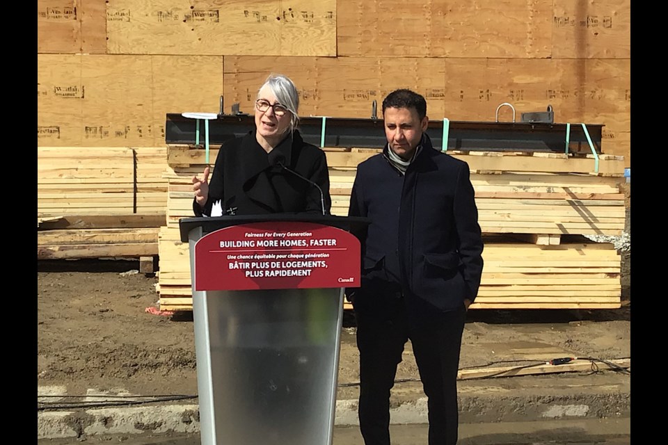 Ministers Patty Hajdu and Arif Virani at announcement in Regina.