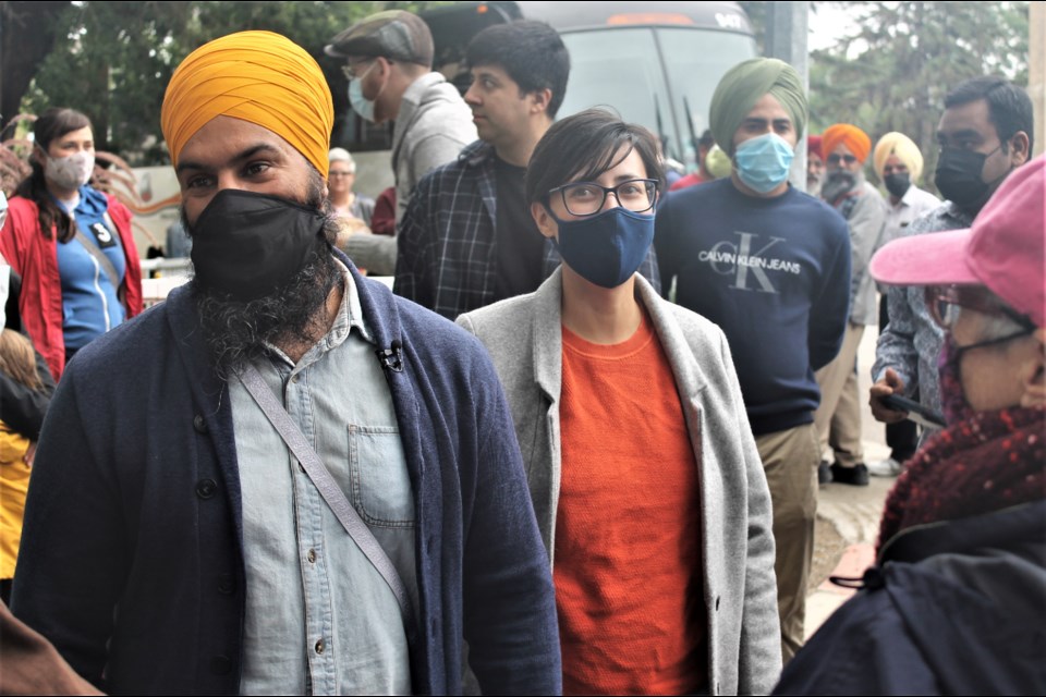 NDP leader Jagmeet Singh (left) and Regina–Lewvan candidate Tria Donaldson (right) mingled with supporters during a campaign stop in Regina on Friday.