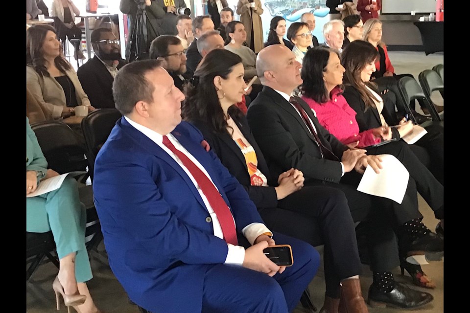 Tim Reid of REAL District, Mayor Sandra Masters, federal Tourism Minister Randy Boissonnault, Sandy Baumgartner, CEO of Saskatchewan Science Centre and Jaime Boldt, Executive Director of Globe Theatre, at federal tourism funding announcement.