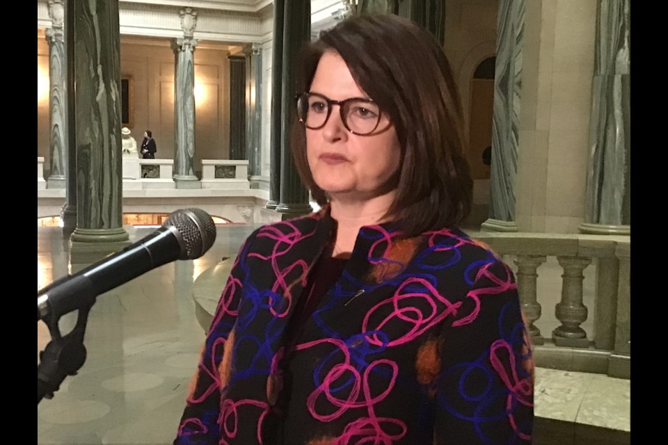 Opposition Leader Carla Beck speaks to reporters May 3 after being tossed out of the Assembly.