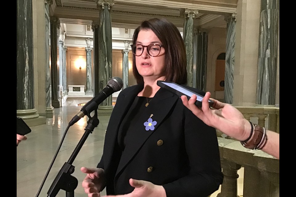 Opposition Leader Carla Beck (file photo) speaks to reporters following Question Period April 17.