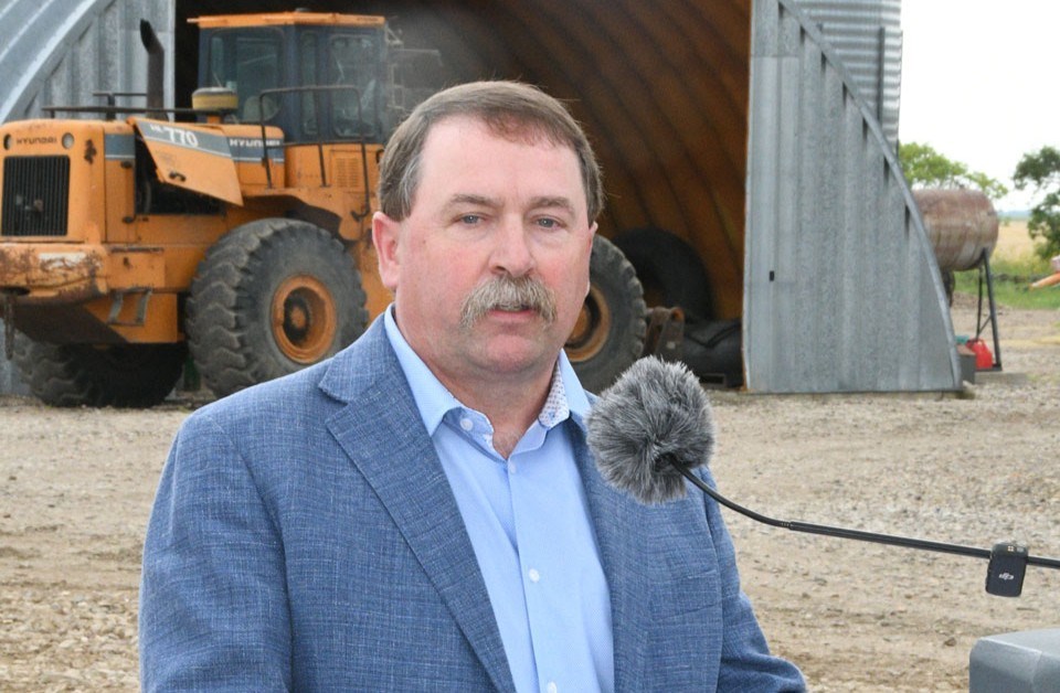 Saskatchewan Agriculture Minister Daryl Harrison gives a speech on Aug. 12 during a harvest kick-off event.