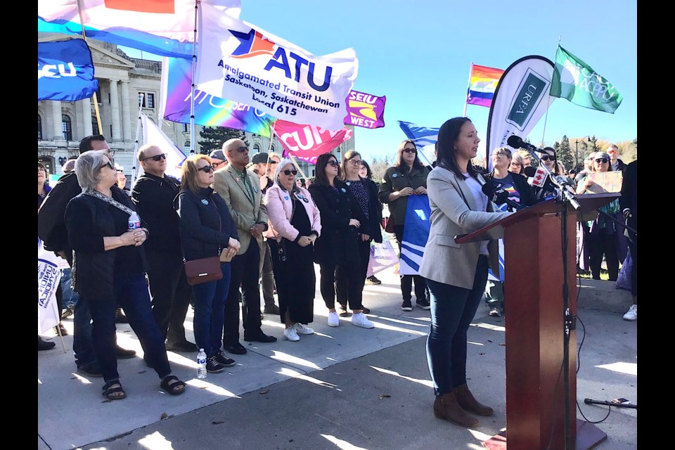 Samantha Becotte of Sask. Teachers Federation speaks at the protest against parental rights legislation at the Leg.