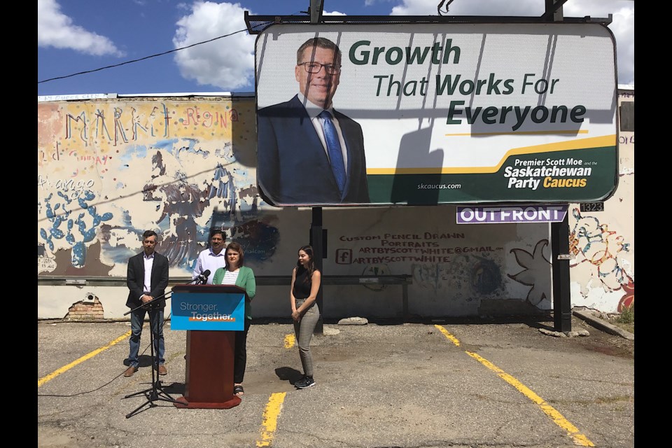 The opposition New Democrats held their media event June 23 in front of a Sask Party “Growth that Works for Everyone” sign.
