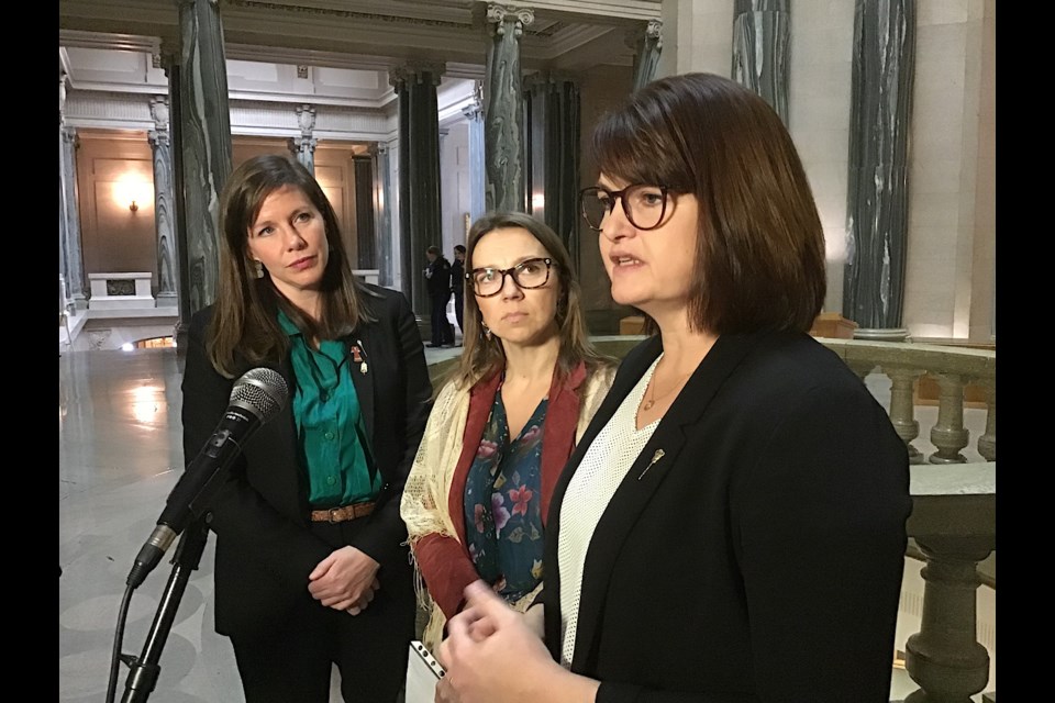 NDP Leader Carla Beck (right) and Critic Meara Conway alongside Dominika Kosowska, who had struggled with a rat and mice infestation in her Saskatoon Housing Authority unit