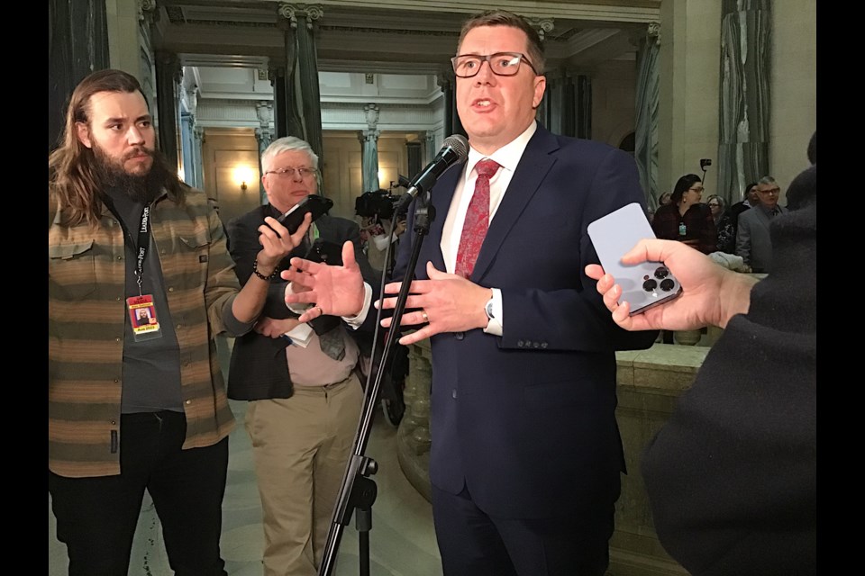 Premier Scott Moe speaks to reporters after the final vote to pass the Saskatchewan First Act.