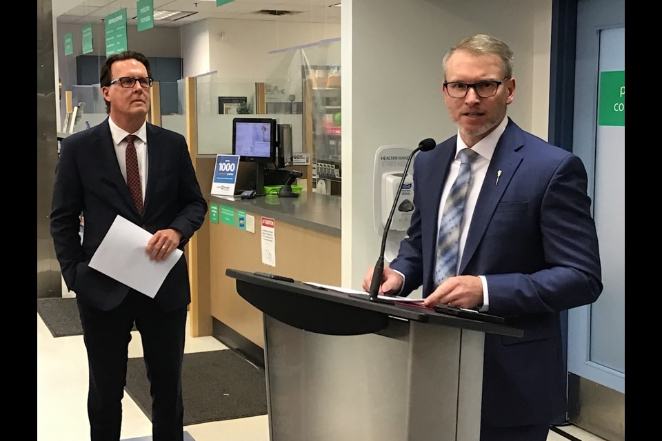 Pharmacy Association of Saskatchewan CEO Michael Fougere and Minister of Rural and Remote Health Everett Hindley speak to reporters Wednesday.