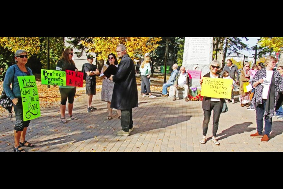 A number of residents gathered Wednesday morning in Weyburn's Memorial Park, in support of parental rights in schools.