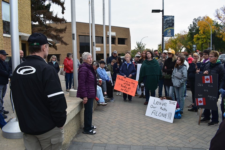 One woman at the Sept. 20 protest alleges that books in the school division in the 1980s made reference to farm boys having sex with animals, and mention a worldwide agenda for the indoctrination of children, referencing the Communist Manifesto.