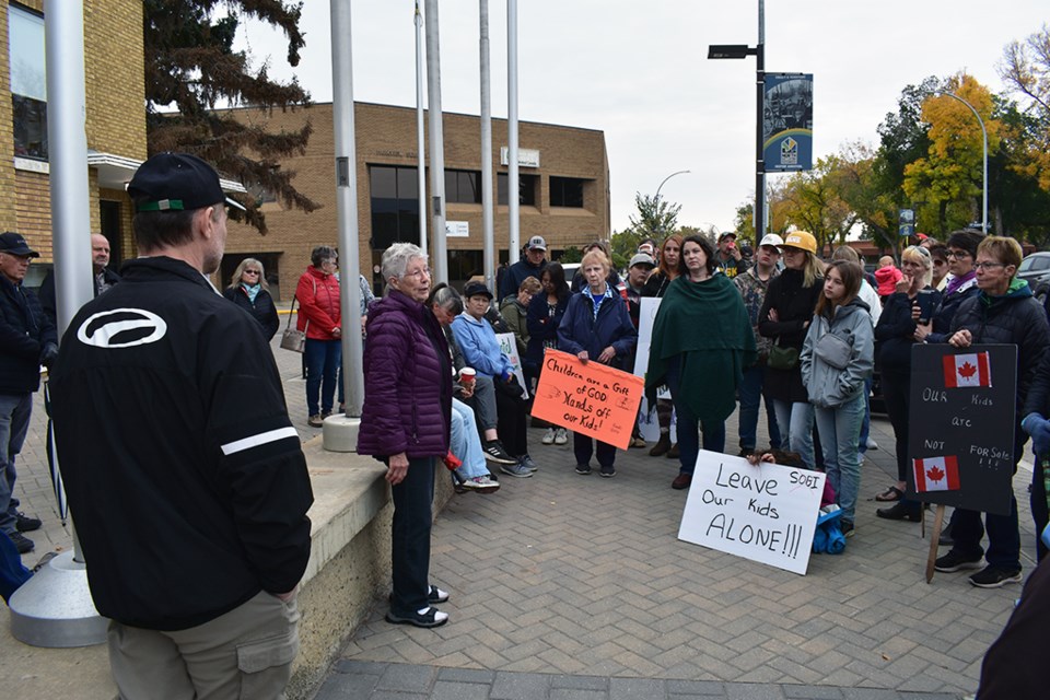 One woman at the Sept. 20 protest alleges that books in the school division in the 1980s made reference to farm boys having sex with animals, and mention a worldwide agenda for the indoctrination of children, referencing the Communist Manifesto.