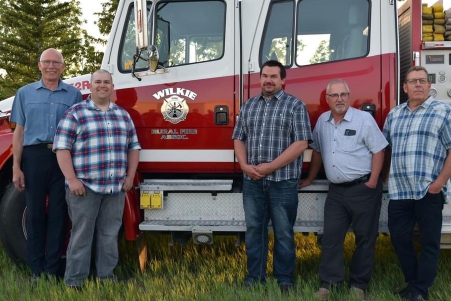 Retired firefighters for the Wilkie and District Fire Department were honoured at a special appreciation event. Pictured here are Grant Miller, Marshall Herzog, Maxwell Herzog, Terry Kosolofski and Dave Kobelsky. Missing were Blair Brandle and Jason Delainey. 