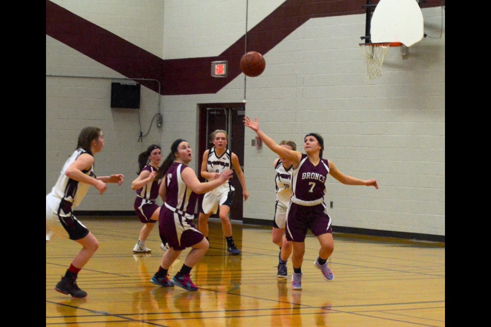 McLurg Broncs players Jaymie Myszczyszyn, Kiri Myszcyszyn and Emily Hango, along with Macklin Sabres Mishaela Stang, Nomi Kratchmer and Addison McCurrry   keep their focus on the ball during conference playoffs.