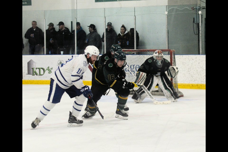 The March 18 third game in Wilkie of the SWHL final between the Wilkie Outlaws and Macklin Mohawks was a battle of the goaltenders .