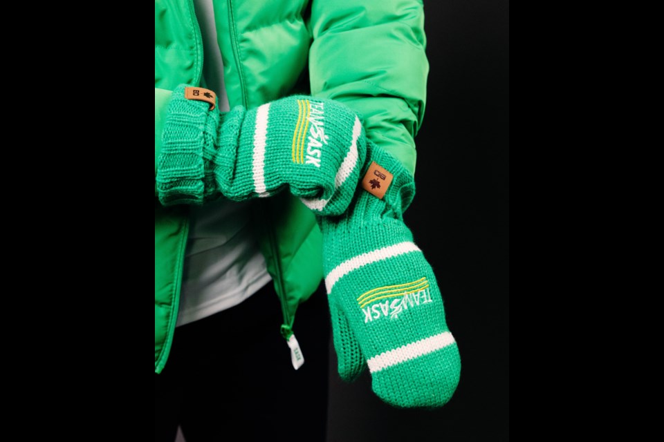 The kit includes a Knit toque and mitts. Mitts feature "Team Sask" logo with a touch of yellow while toque has the games logo on the front and "SASK" featured above on the top.