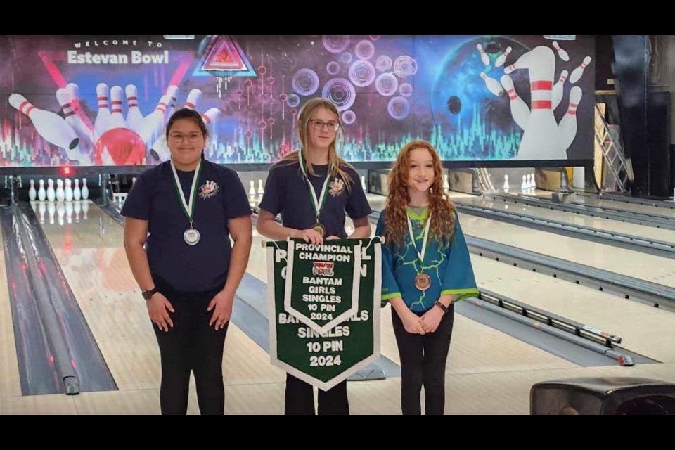 Kadence Kraushaar, middle, won gold, while Teal Bramham won silver. 