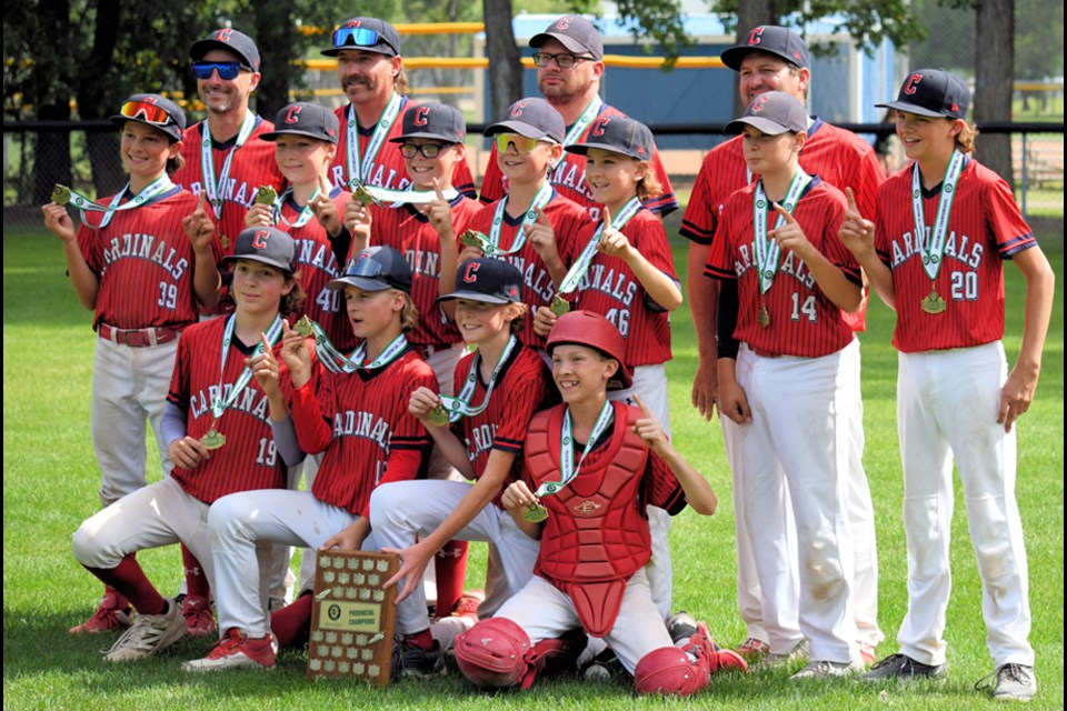 The Unity Cardinals are 13U AA Tier 3 provincial champions. Left to right: back row, assistant coaches Kyle Clark, Tyler Bosch, Curtis Sieben and head coach Cory Hoffman; middle row, Owen Neufeld, London Goodall, Gage Bosch, Caleb Hoffmann, Maddox Clark, Alex Sieben, Haston Grimard; front row, Kody Walz, Kace McCrea, Liam Close and Wyatt Anderson. 