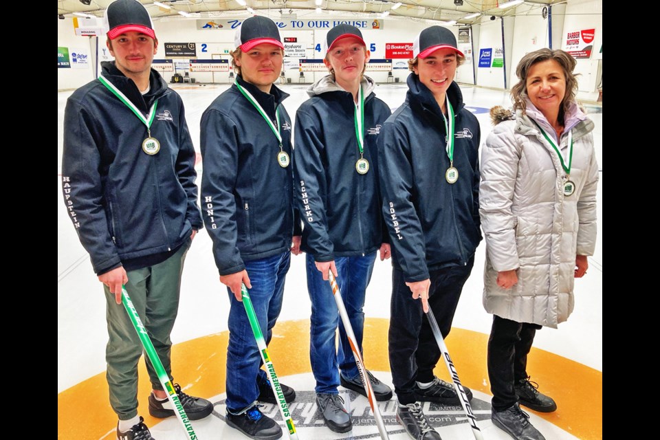Team Haupstein posed with their gold medals after winning the U18 event at the CurlSask Barber Motors jr. curling event over the weekend; the team members are Karter Haupstein, Dylan Honig, Caden Schurko and Jyler Goebel, with coach Pam Haupstein.