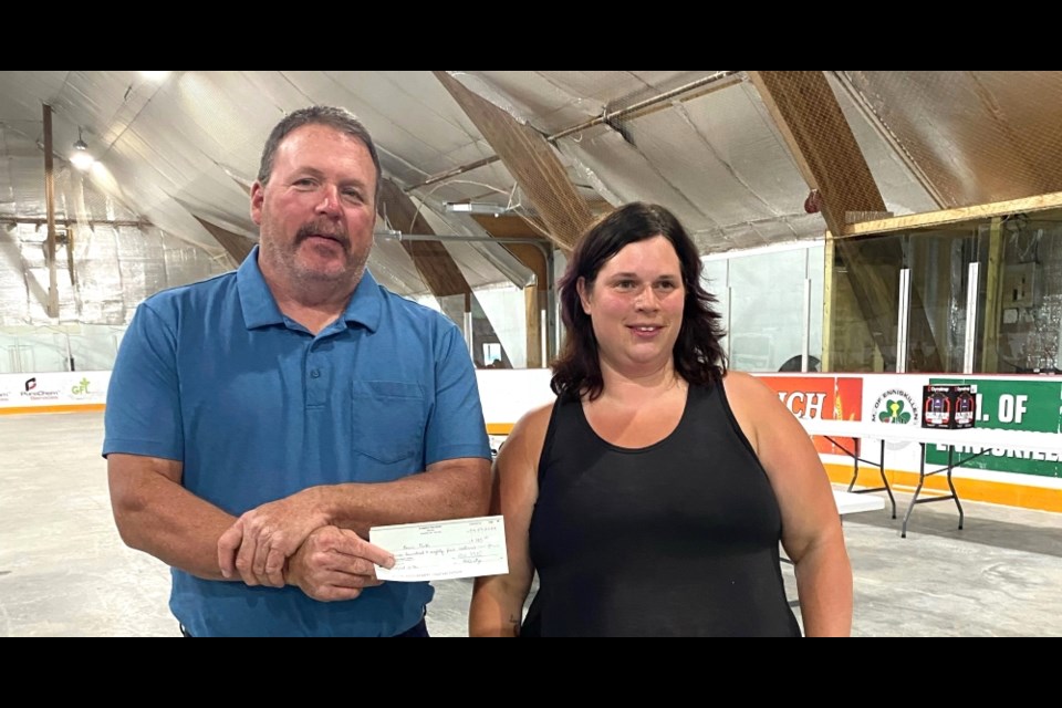Kevin Frith was the winner in adult categories; pictured he is receiving the prize from Kim Dietze, president of the Alameda Fish Derby. 