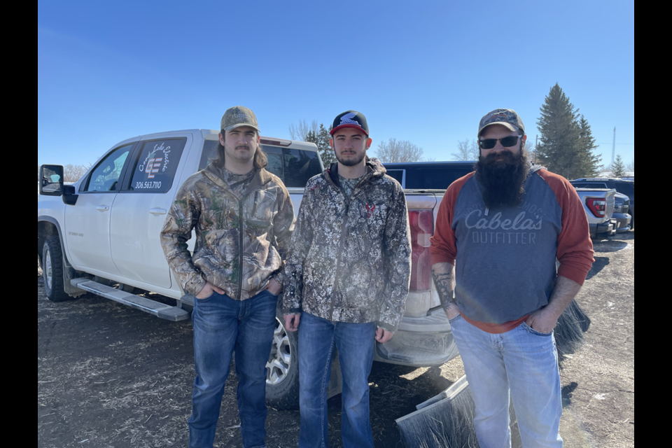 Among the archers taking part in the Veregin 3-D shoot, from left, were: Andrew Owchar, his brother Michael and their father Mike of Canora. Their impressive scores for two rounds of shooting were: 366, 368 and 344 out of a possible 400.