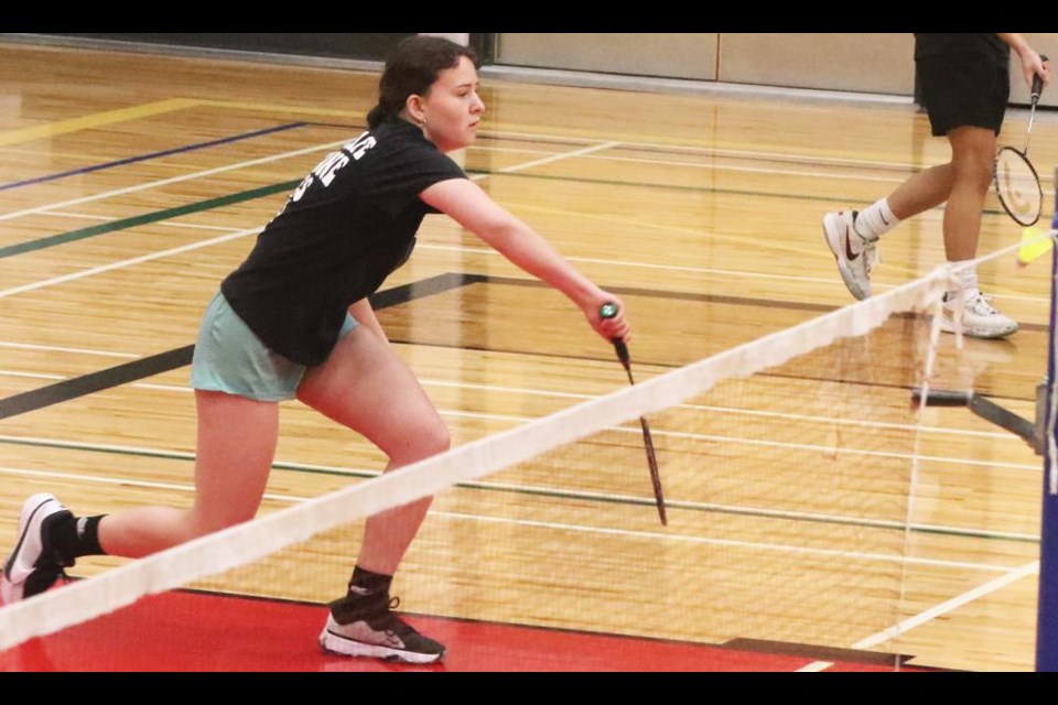 Weyburn Comp athlete Anna Tronson got ready to return the birdie, in a girls singles match on Saturday morning at the Cugnet Centre.