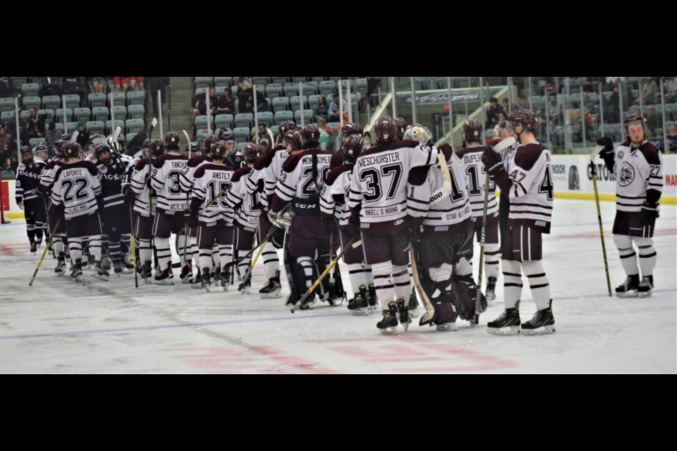 The Flin Flon Bombers and the Pickering Panthers shake hands after Pickering's quarter-final victory. 