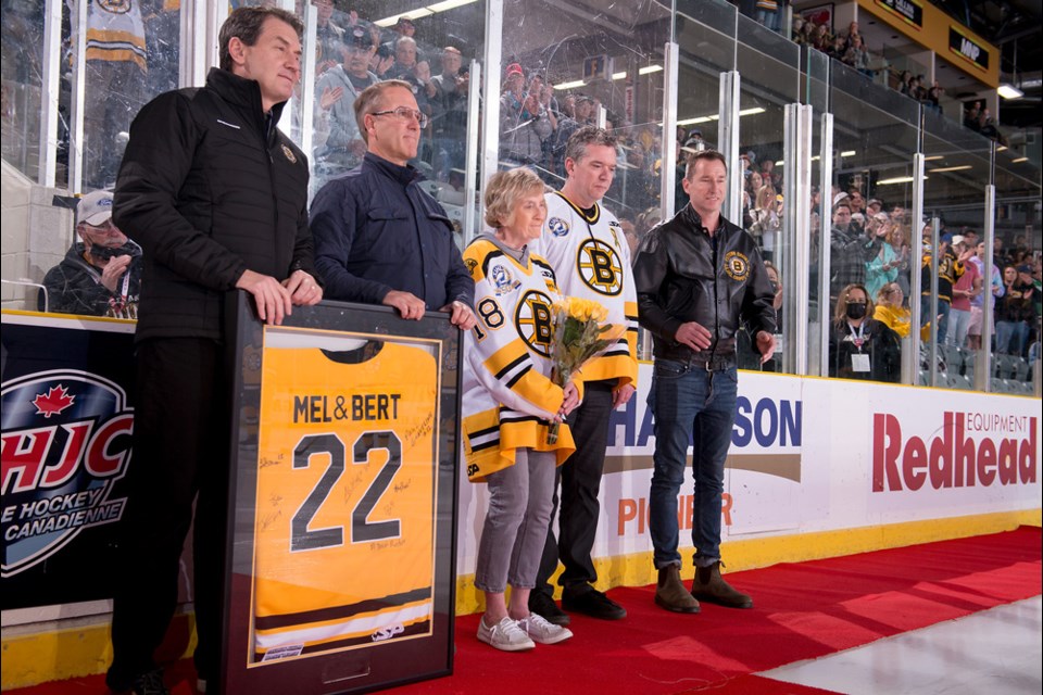 Melodye Pierson, middle, was honoured before the start of Monday's Bruin game. 