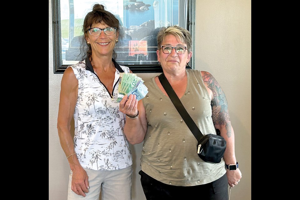 Robin Brin was the 50/50 winner.
Presented by Laurie Stianson.
