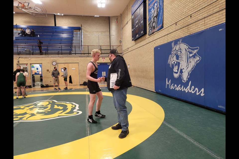 Wilkie wrestling coach and McLurg educator, Chris Kent, hopes for a competition season for wrestlers in 2022.  Action from a Sask. Wrestling event in December 2021.