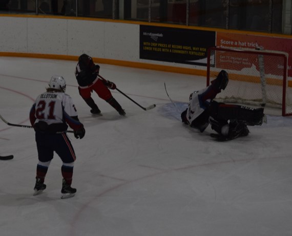 Toby Olynyk of Buchanan scored a pretty first-period goal for the Cobras (dark jerseys), deking around the Ituna goalie and stuffing the puck into the back of the net during Canora’s dominant 11-3 victory over the Avalanche on Dec. 23. 