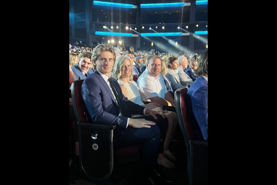 Former Macklin resident, Cole Reschny, supported by his parents Allison and Clinton Reschny at the NHL draft that took place June 27 in Los Angeles.