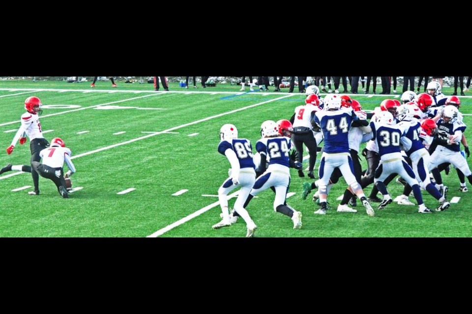 WCS Eagles kicker Carter Houghton lined up to kick a field goal, in this play vs the Greenall Griffins on Saturday.