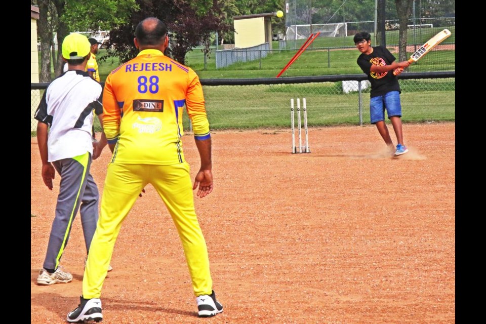 People were able to try their hand at using a cricket bat, at the free clinic held on Saturday afternoon.