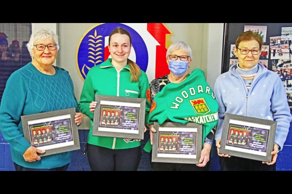 The 1976 Provincial Women's Curling Champions, the Delores Miller rink, received Honourary Life Memberships to the Weyburn Curling Club on Monday, Boxing day. From left are skip Delores Miller; Abby Johnson, stepping in for her late grandmother, third Gaby Kot; second Marg Woodard, and lead Jean Lowenberger.