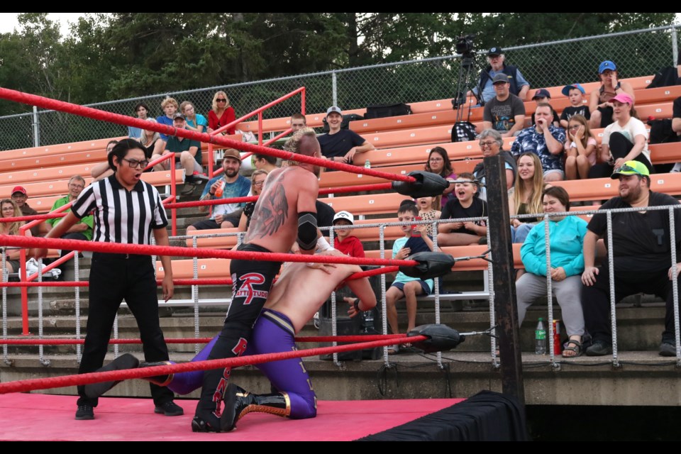 Usually the realm of football fans, the stands were home to cheering wrestling fans at Century Field Friday.