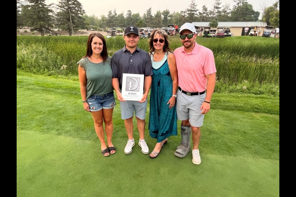 Dave Price Memorial Horse Race winner Carson Harcourt, second from left, with members of the Price family Taunia Turnbull, Laureen Price and Tyson Price. 