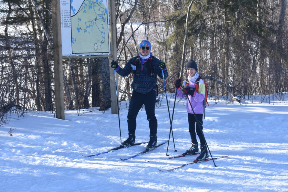Calvin Lai and his daughter Summer from Regina enjoyed the sunny weather out on the trails during the annual Duck Mountain Ski Loppet on March 24. 