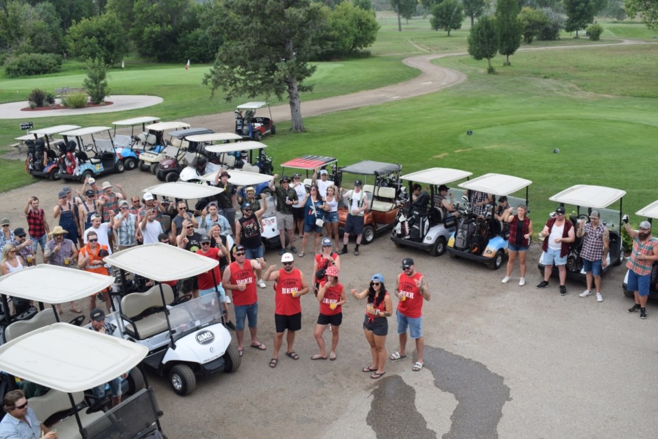 Participants gathered for a toast to Dustin Pratt prior to the tournament beginning. 
